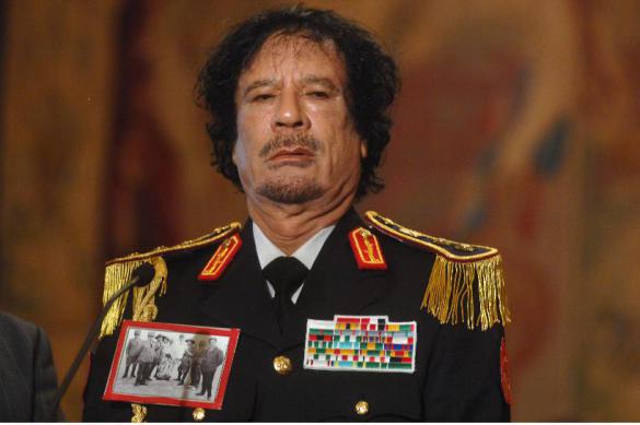 Gaddafi's predictions come true as Americans gang rape the world. 62943.jpeg